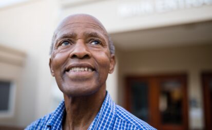 A contemplative senior man gazes upward, reflecting on his life and beginning to release ego attachment in later years.A contemplative senior man gazes upward, reflecting on his life and beginning to release ego attachment in later years.