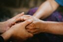 spiritual seniors praying hands