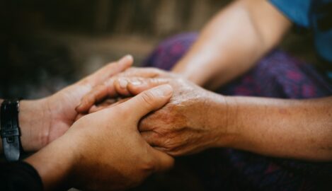 spiritual seniors praying hands