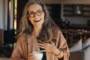senior woman embraces kindness and connection in later life through the miracle of a smile