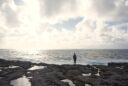 older adult reflecting in nature symbolizing the spiritual instinct in later life