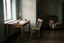quiet interior space with light and shadow suggesting reflection and inner work in later life